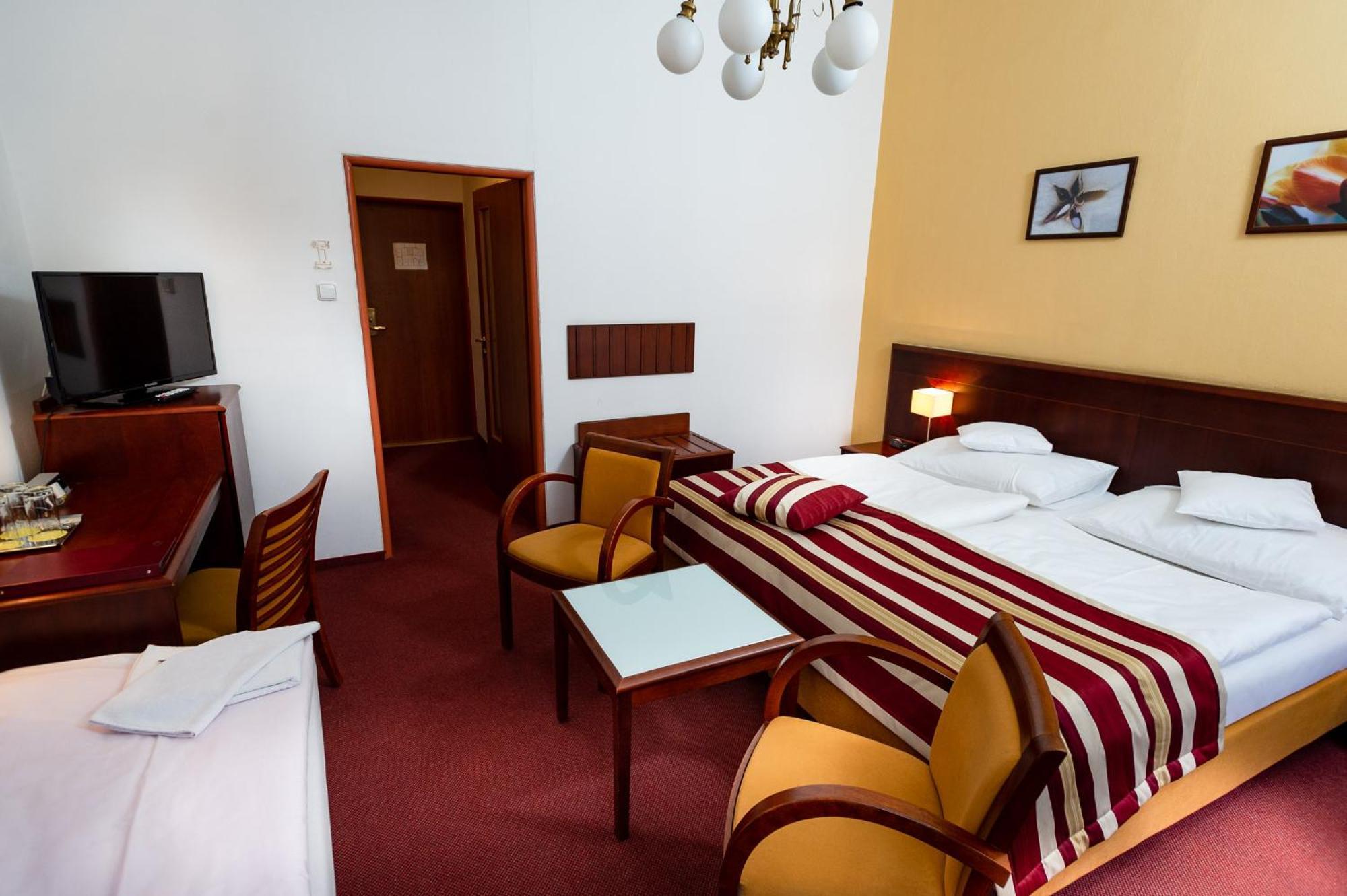 Tweepersoonskamer met 1 extra bed