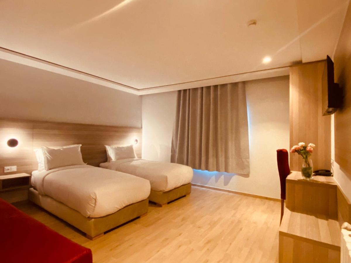Chambre Deluxe (2 Adultes + 1 Enfant)