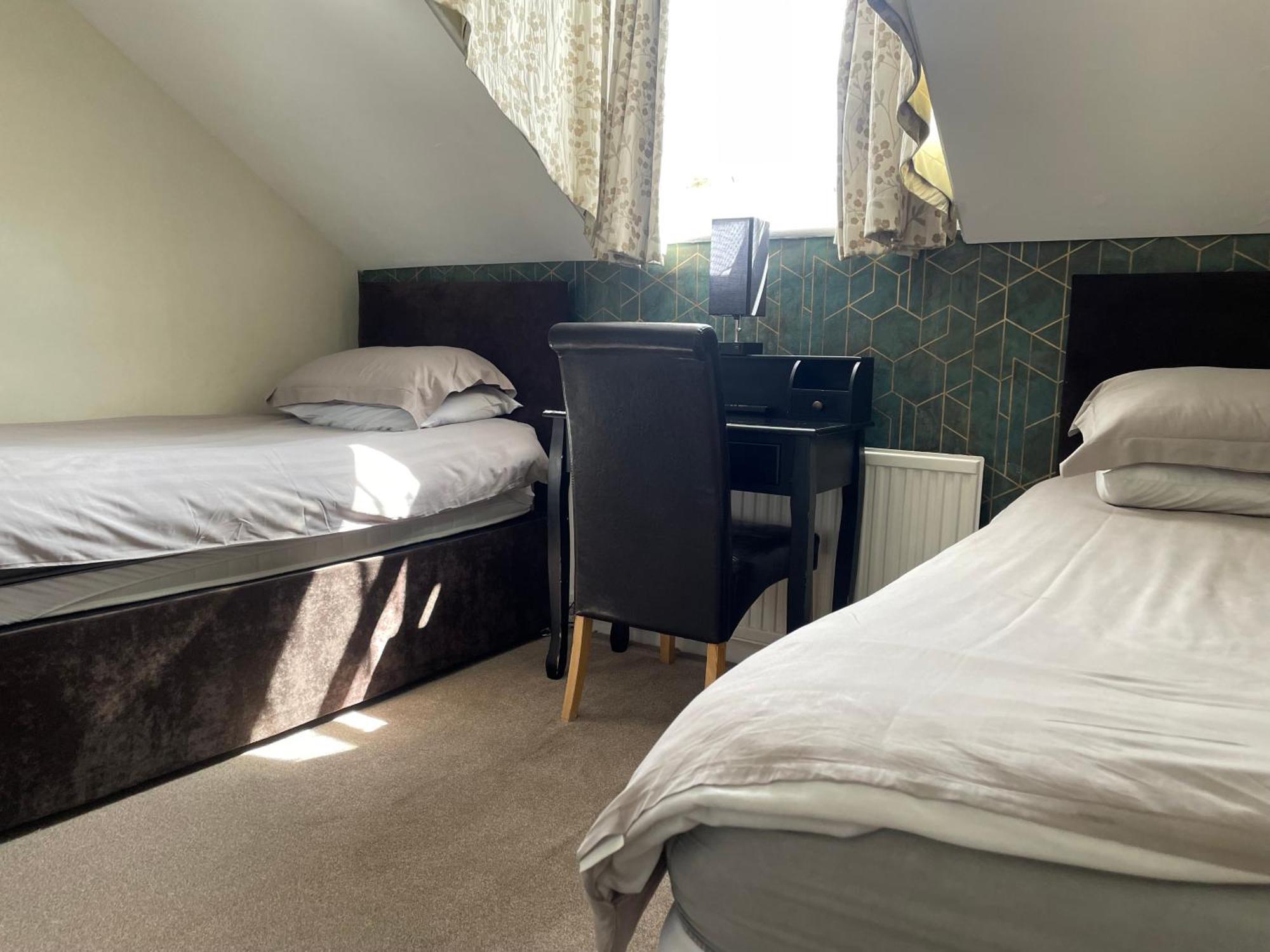 Tweepersoonskamer met 2 Aparte Bedden