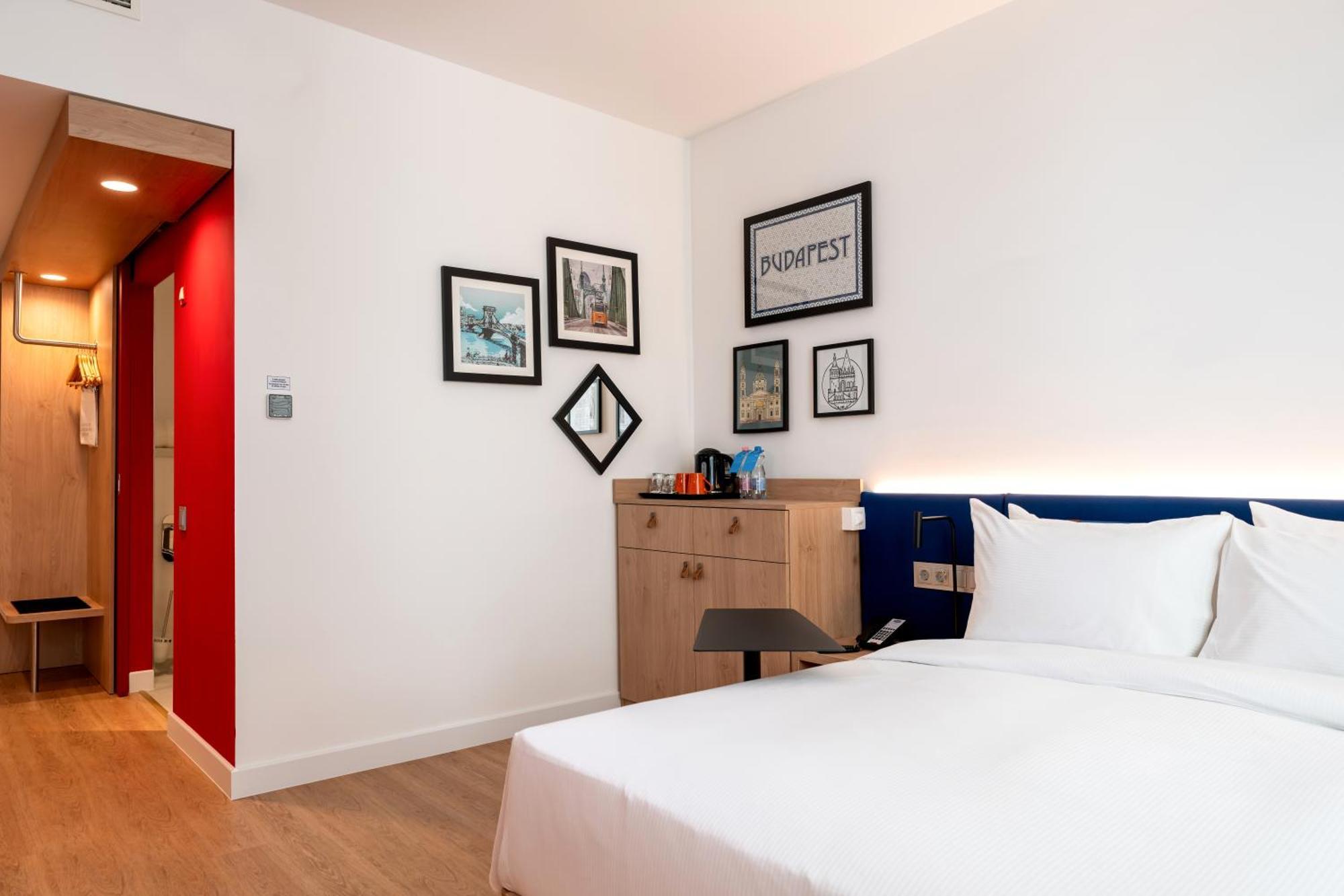 Kamer met Queensize Bed - Geschikt voor Gasten met een Lichamelijke Beperking
