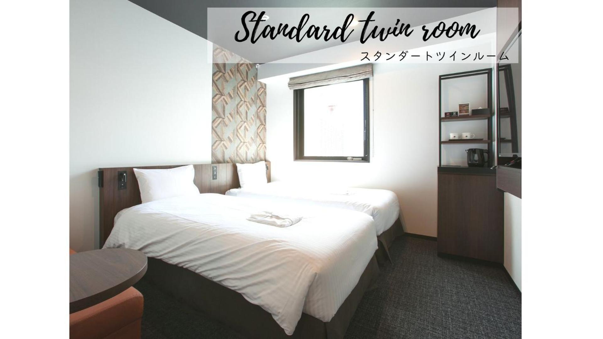 Standard Twin Room - Non-Smoking,1555776406:JPEG