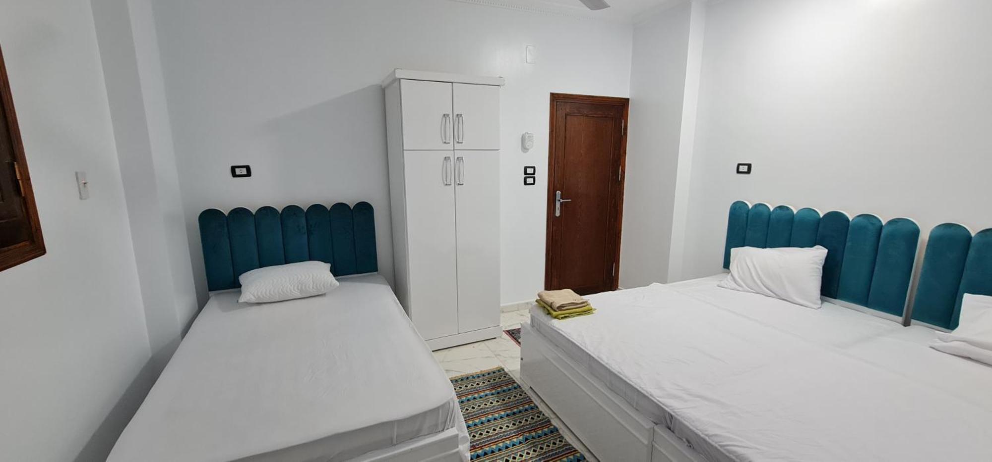 Chambre Triple avec Salle de Bains Privative