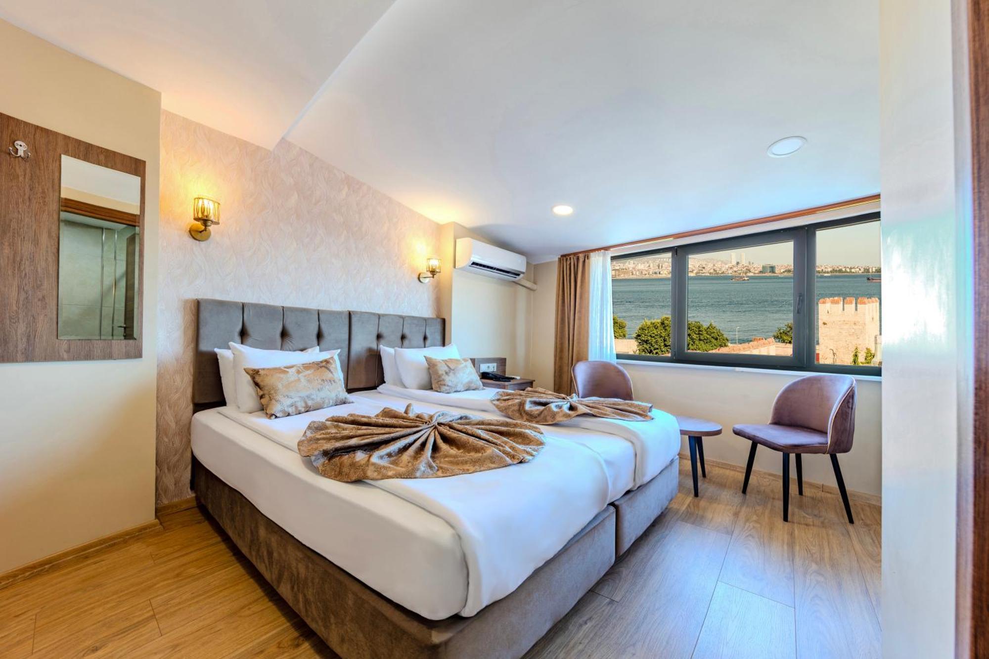 Double or Twin Room with Side Sea View,1607746928:JPEG