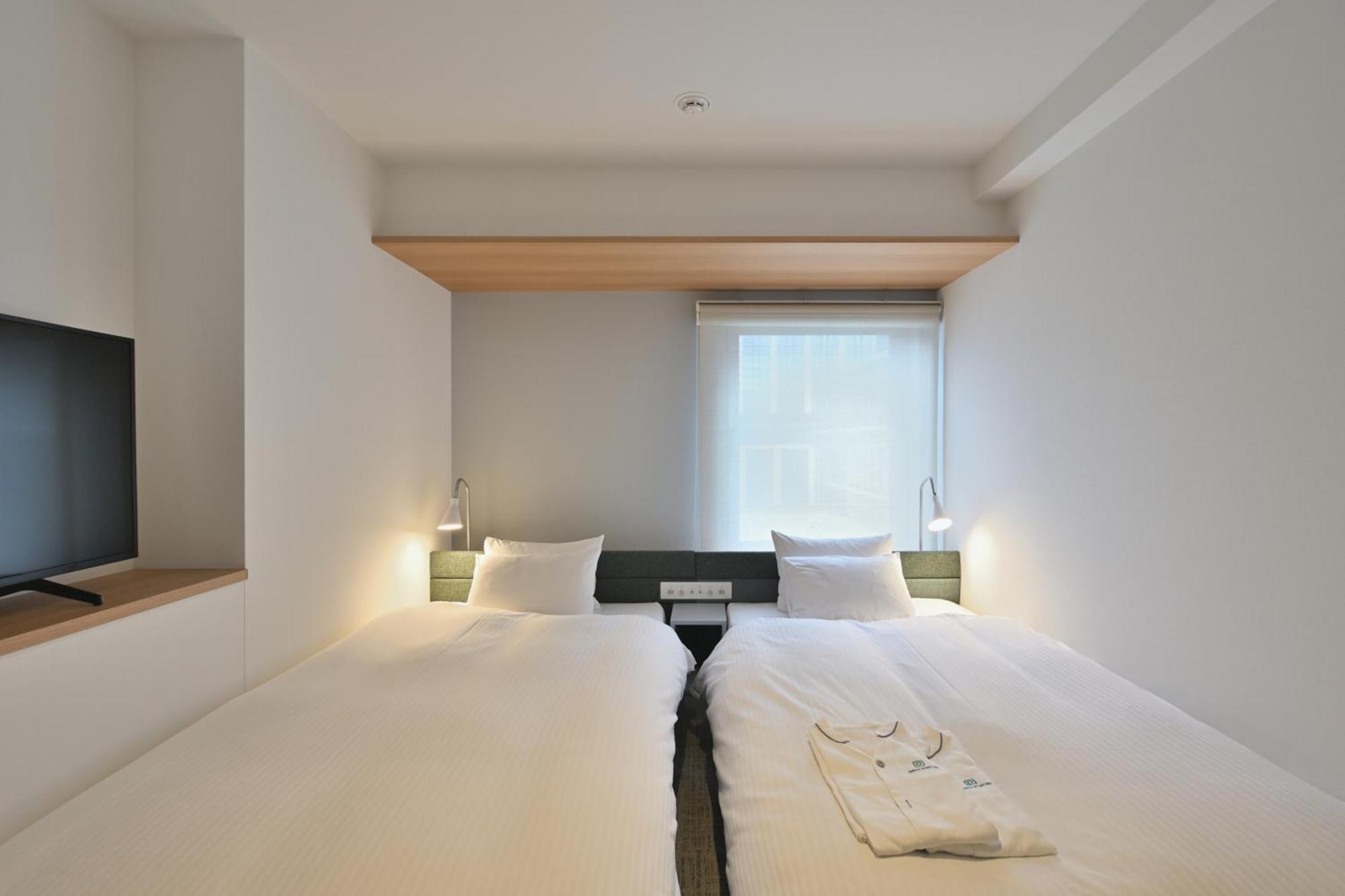 Superior Compact Twin Room Complimentary