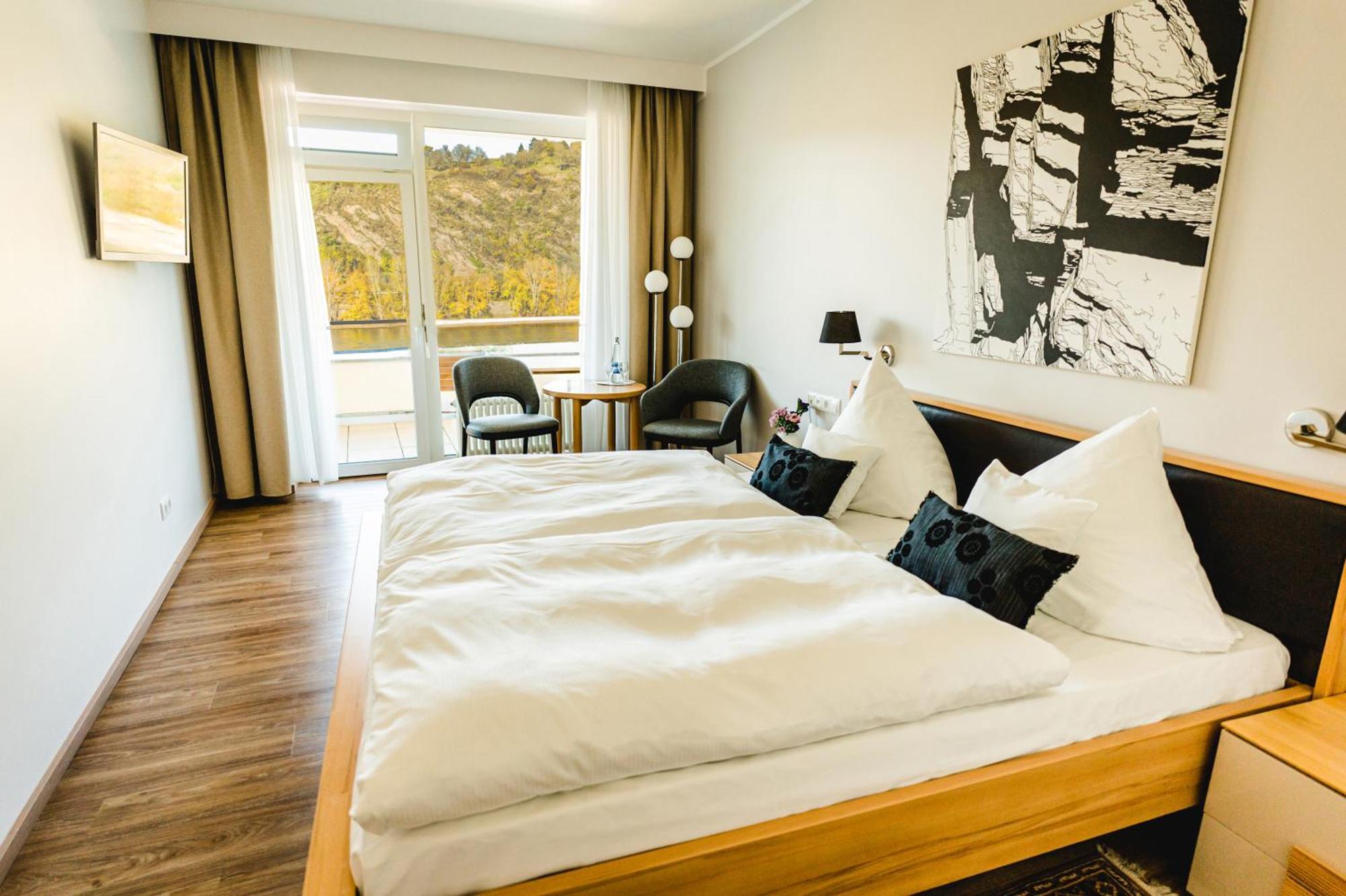 Tweepersoonskamer met Balkon en Uitzicht op de Rivier