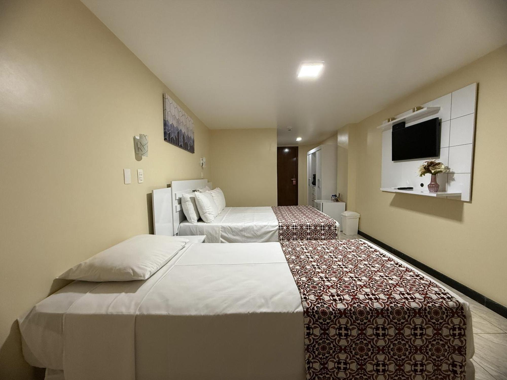 Triple Room with double bed and