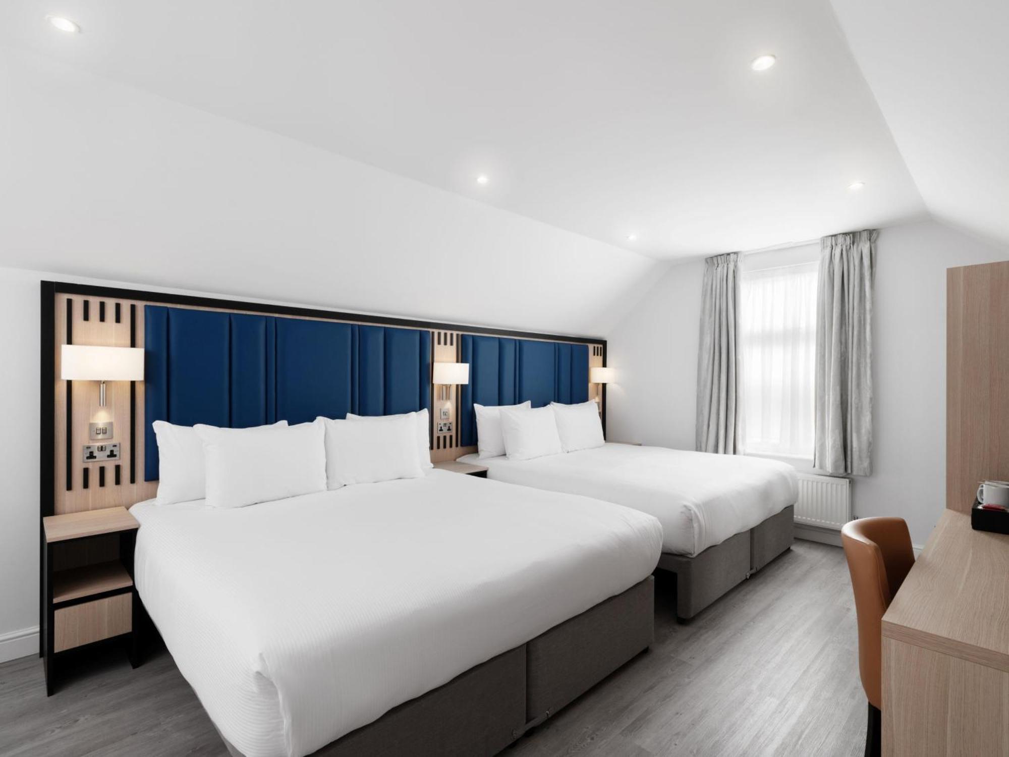 Tweepersoonskamer met 2 Kingsize Bedden