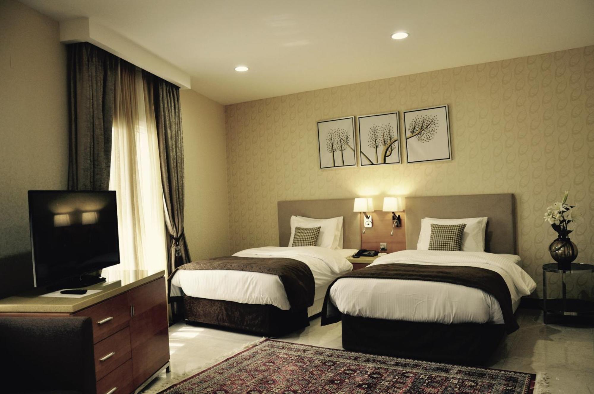 Chambre Deluxe Double ou Lits Jumeaux