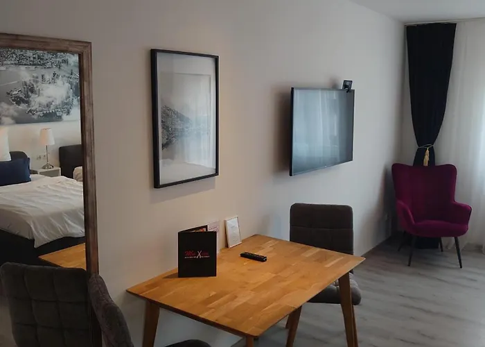 Maxim Apartments